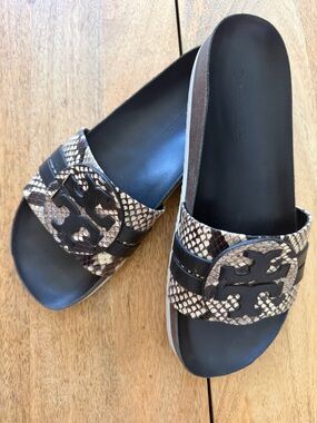Tory Burch “Leigh” Snake-Print Logo Slide Sandals in Black and Brown